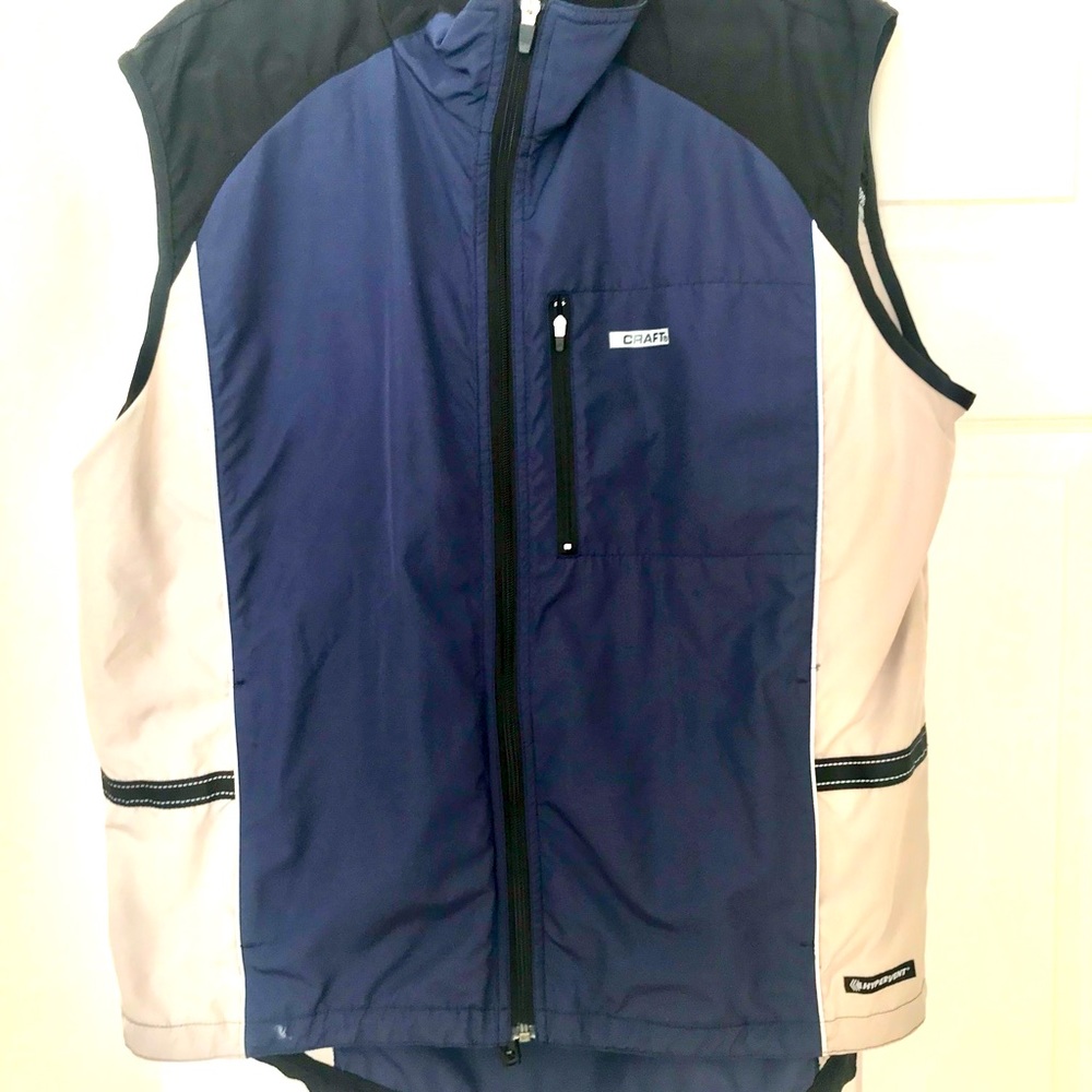Running vest with reflective strips and venting